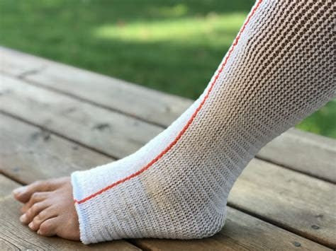 Compression Dynamics Edemawear Lite Lymphedema Stockinet Medium, Max Limb Circumference 90cm (24") Length 86cm (34") For Tender Skin, Orange Stripe, Longitudinal Compression, Latex-Free